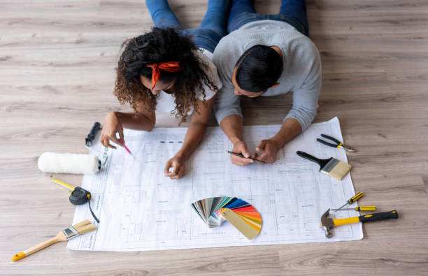 istock Couple working on a home improvement project 1188217336