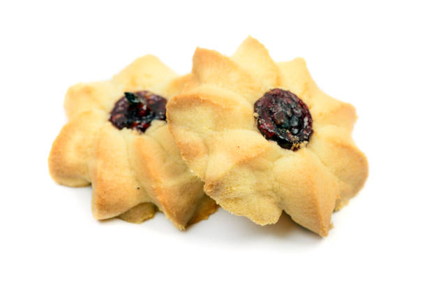 istock homemade pair of jam cookies isolated 1188217849