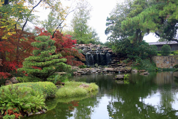 istock Vibrant fall foliage, autumn colors with rock waterfall 1188217885