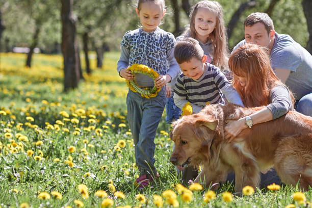 istock happy family for a walk in the spring Park 1188218097