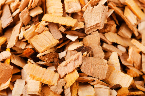 Pile of wood smoking chips isolated on white background
