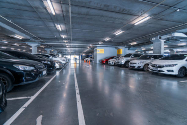 istock Blurred image Parking garage In the mall for background. 1188218840