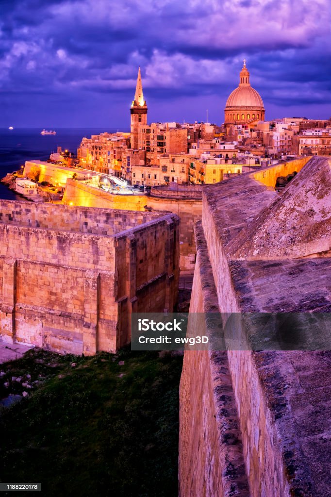 Night view of Valletta Old Town with Cathedral of Saint Paul and Marsamxett Harbour, Malta Malta Stock Photo