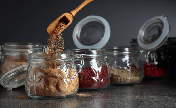 istock Various Oriental spices and herbs in glass jars. 1188220424