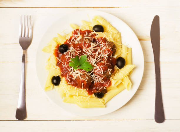 istock Spaghetti pasta with meatballs, parmesan cheese and tomato sauce 1188221721