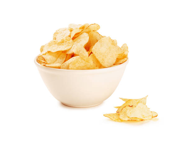 istock Bowl of home made potato chips on a white background 1188225611