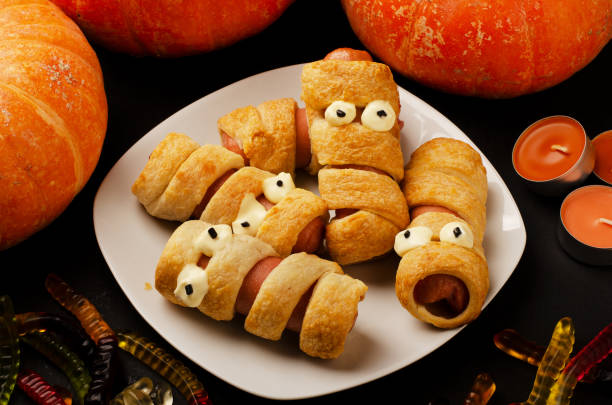 istock Scary sausage mummies in dough 1188225633