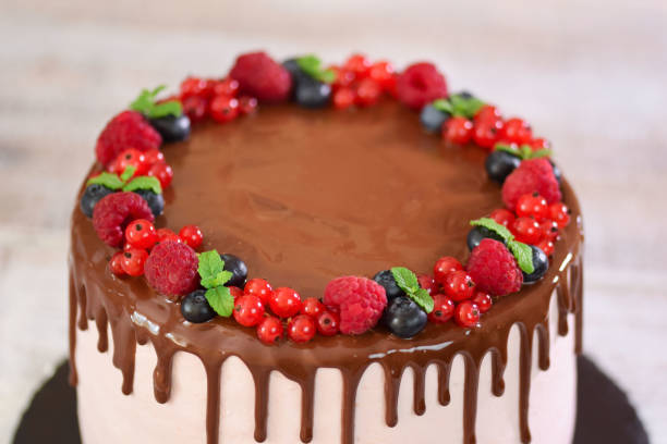 istock Delicious cake decorated with summer berries. Top view. 1188229442