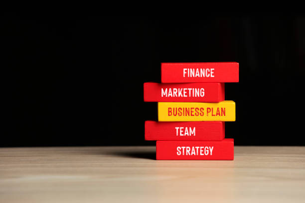 istock Business Plan Concept with Related Keywords on Wooden Blocks 1188230164