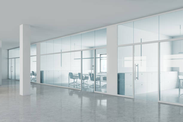 istock White and glass office hall with meeting room 1188232056