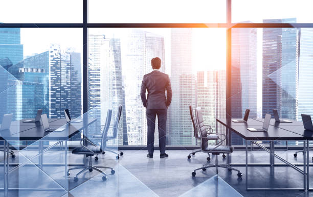 istock Business leader looking at city, brainstorm 1188233417