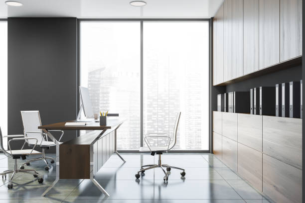 istock Side view of gray CEO office with bookcase 1188234804