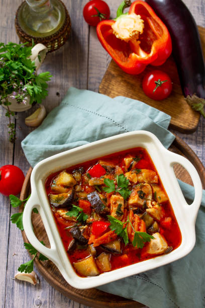 istock Thanksgiving Autumn Menu. Stewed meat with eggplant and eggplant vegetables on a rustic table. 1188235397