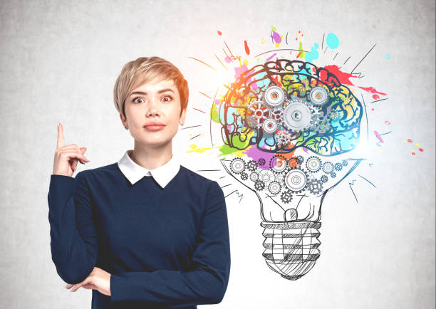 istock Woman pointing up and her good idea 1188237659