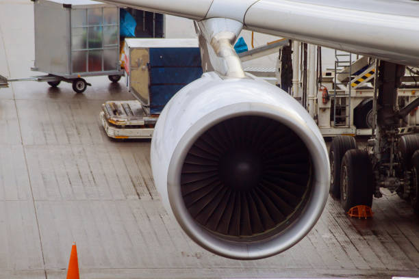 istock jet engine against a plane at the airport on loading 1188238051