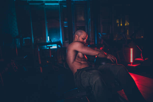 istock Muscular man doing sit ups with medicine ball 1188239490