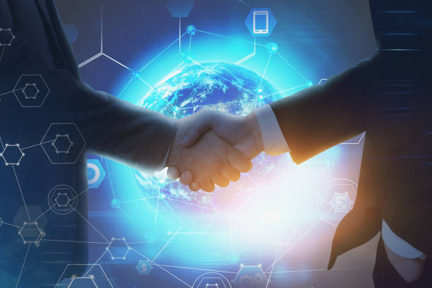 istock Two businessmen shaking hands, partnership 1188239665