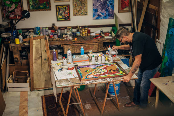 istock Male artist creating abstract painting 1188241114
