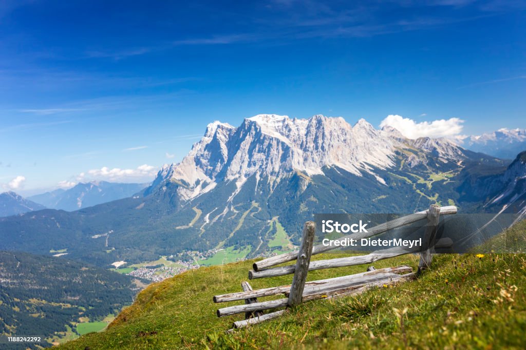 Lonely bench with  view to Zugspitze, Alps Bavaria, Germany, Upper Bavaria, Bench, Garmisch-Partenkirchen, Ehrwald Zugspitze Mountain Stock Photo