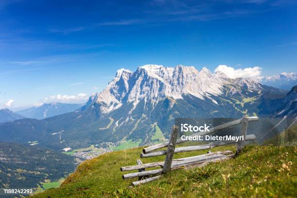 Lonely Bench With View To Zugspitze Alps Stock Photo - Download Image Now - Zugspitze Mountain, Germany, Adventure