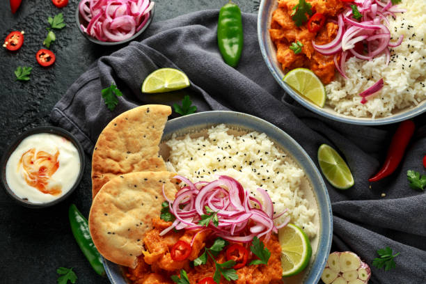 istock Meat free butternut squash curry with jasmine rice, pickled onions and naan bread 1188245106