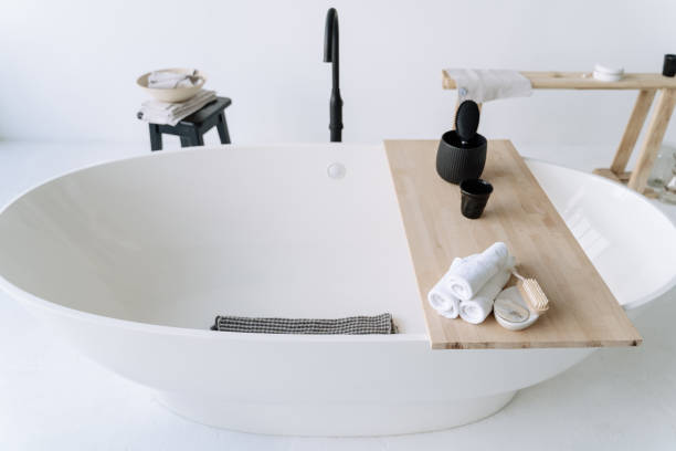 istock White Oval Bathtub Bath Accessory Counter Closeup 1188247922
