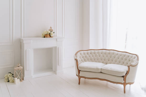 istock Sofa and Fireplace in Classic White Living Room 1188247961