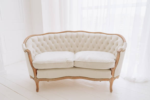 istock Vintage Sofa On Wooden Floor White Interior Design 1188248006
