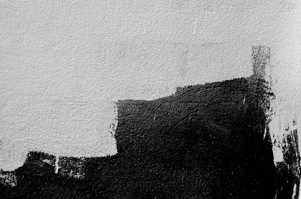 istock Soft image.Wall grunge black concrete with light background. Dirty,dust wall concrete blackboard texture and splash white color or abstract background. 1188252024