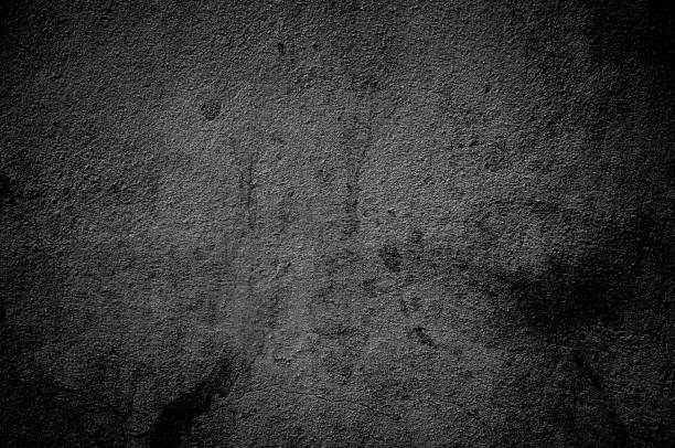 istock Wall grunge black concrete with light background. Dirty,dust wall concrete blackboard texture and splash white color or abstract background. Dark image. 1188252032