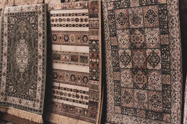 istock Vintage patchwork background on retro handmade carpet. Patterns on texture of old blanket surface. 1188253106