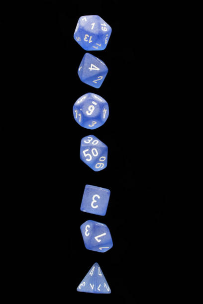 istock RPG set blue dice for playing role playing games on black blackground. 1188253200