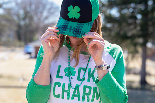 woman wearing green irish clothing for St Patty's Day party