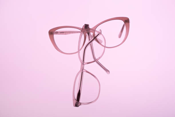 istock Transparent Glasses on pink background 1188258902
