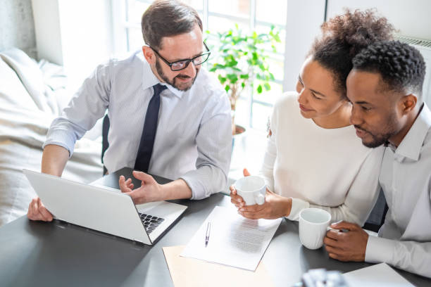 family couple consultations with a lawyer or insurance agent. - lawyer family talking discussion imagens e fotografias de stock