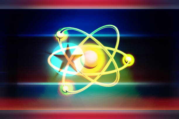 istock Nuclear bomb, nuclear test. Atom nuclear model on North Korean scratched Flag. 3d illustration 1188261535