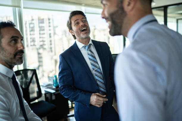 istock Coworkers talking on a informal meeting at office 1188264137