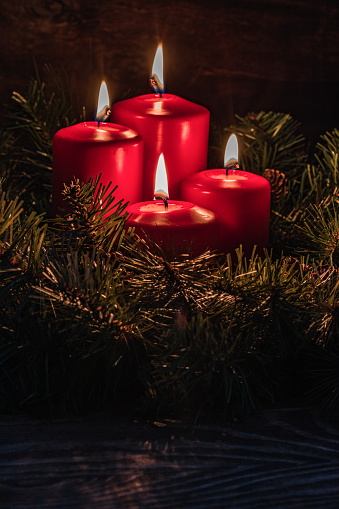 Christmas decoration with christmas four candles burning for advent season