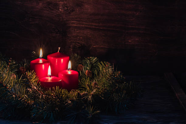 istock Three Advent burning candles, christmas decoration, postcard concept 1188264298