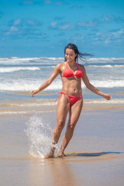 istock Brazilian girl on the beach 1188267020