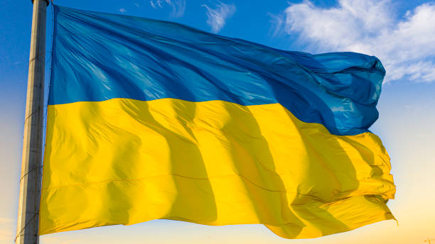 istock Ukrainian flag background of blue sky with white clouds. 1188268802