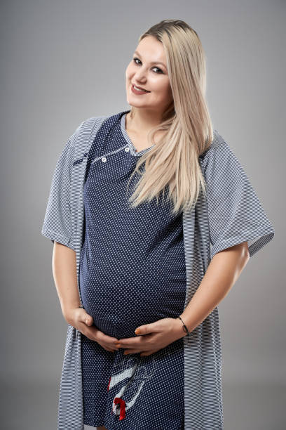 istock Pregnant lady in pajamas 1188274515