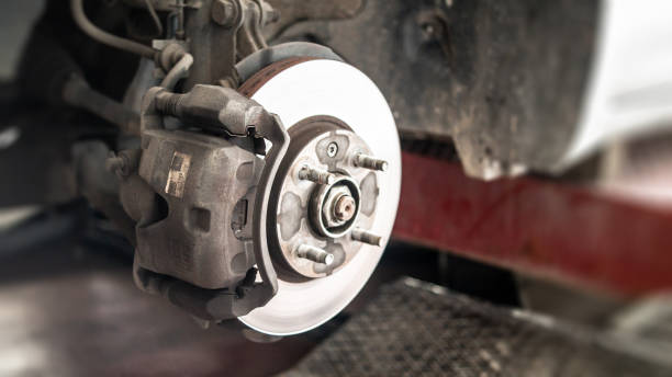 istock brake disc change during vehicle maintenance 1188276125