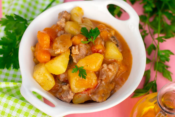 Vegetable stew with pork meat, pumpkin, tomato and potatoes