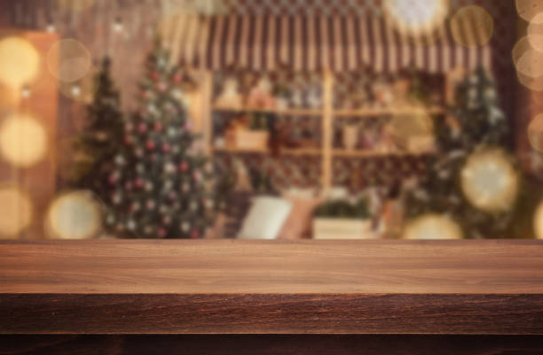 istock Wooden desk on bokeh blur abstract christmas background 1188281456