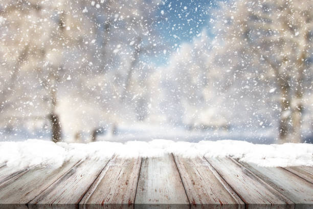 istock Wooden desk on bokeh blur abstract natural background 1188281603