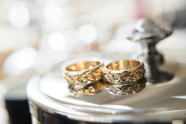 istock Creative gold wedding rings, close up. 1188281716