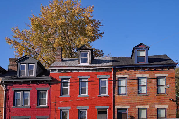 istock Old brick row houses with dormer windows 1188281757