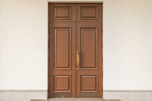 istock Brown wooden doubled-up door texture 1188287850