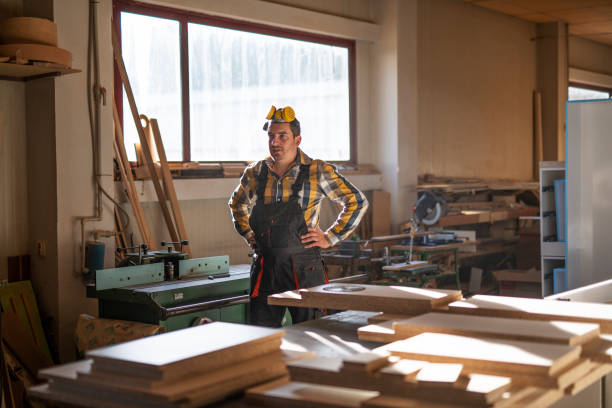 istock Portrait of carpenter in workshop. 1188288117